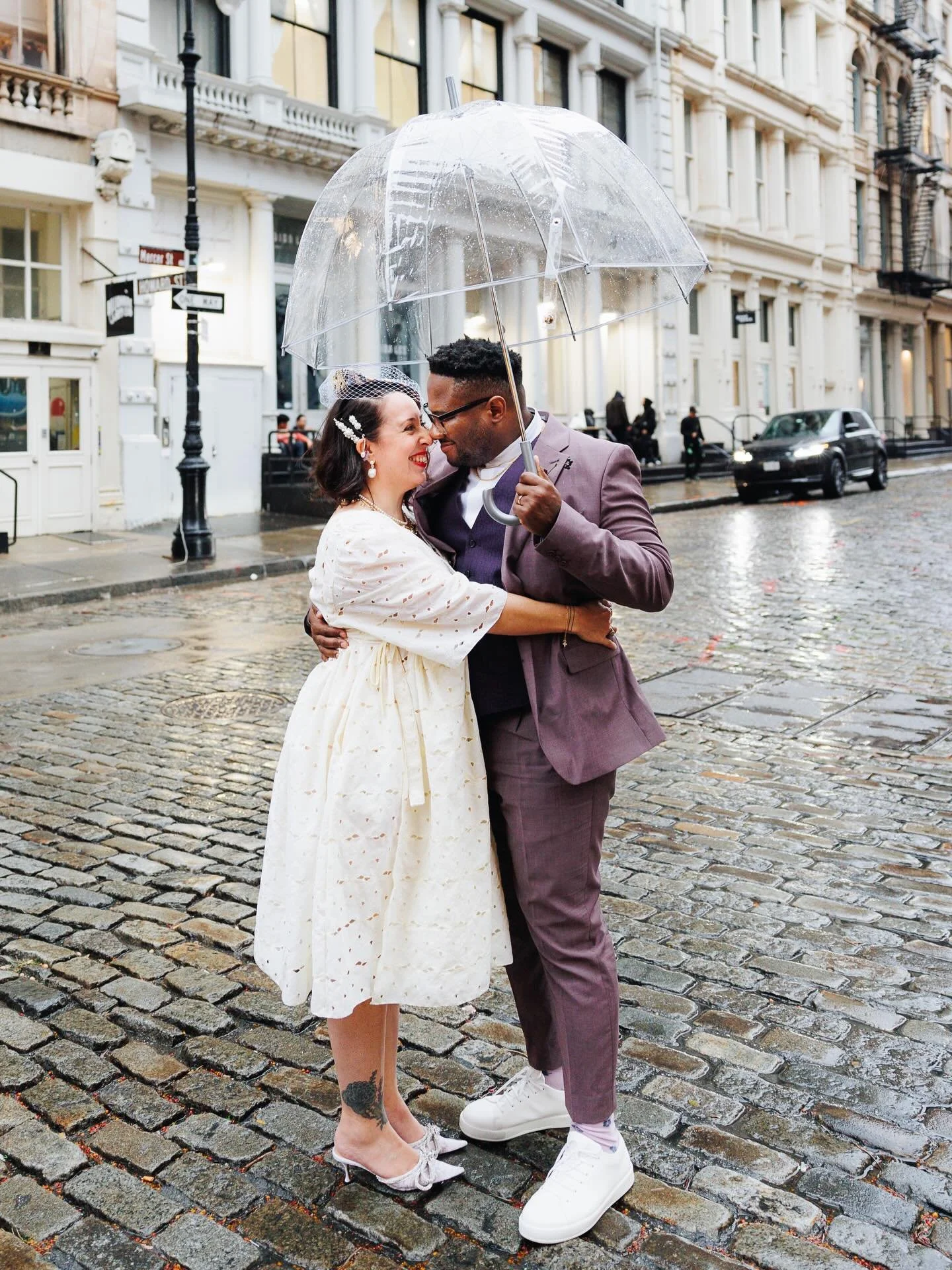 ☔️ today's rain reminds me of Claire &amp; Nnamdi's downpour afternoon. It rained so hard the streets of SoHo cleared out - but these two splashed their way through the streets, laughing and giddy. One of my favorite rainy days ever.