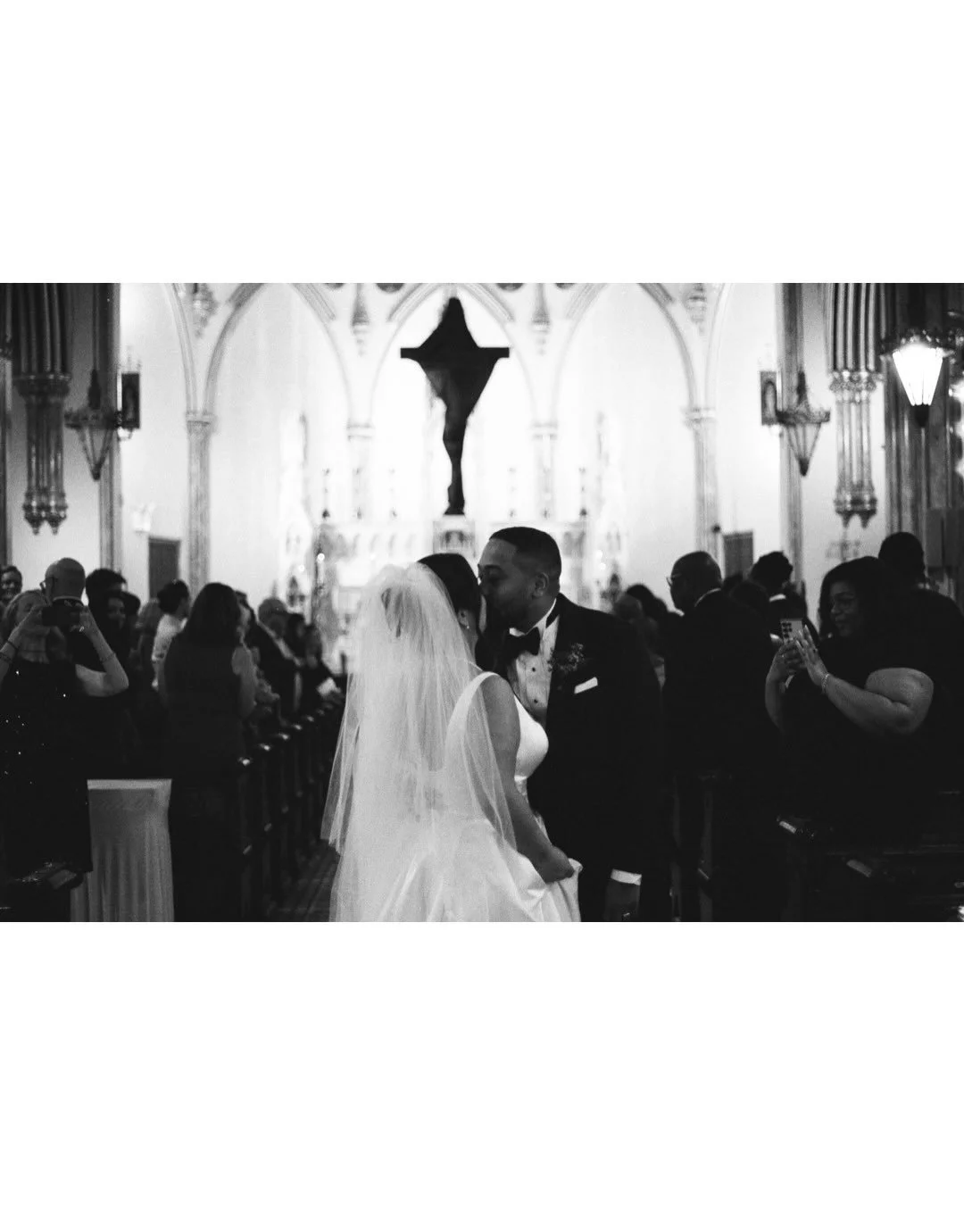 A few favorite black &amp; white moments from Patricia &amp; Gregory's gorgeous wedding day, at church and Liberty Warehouse. Not as many couples request black &amp; white film but when the results come back like this, it's time I use it more

Planni