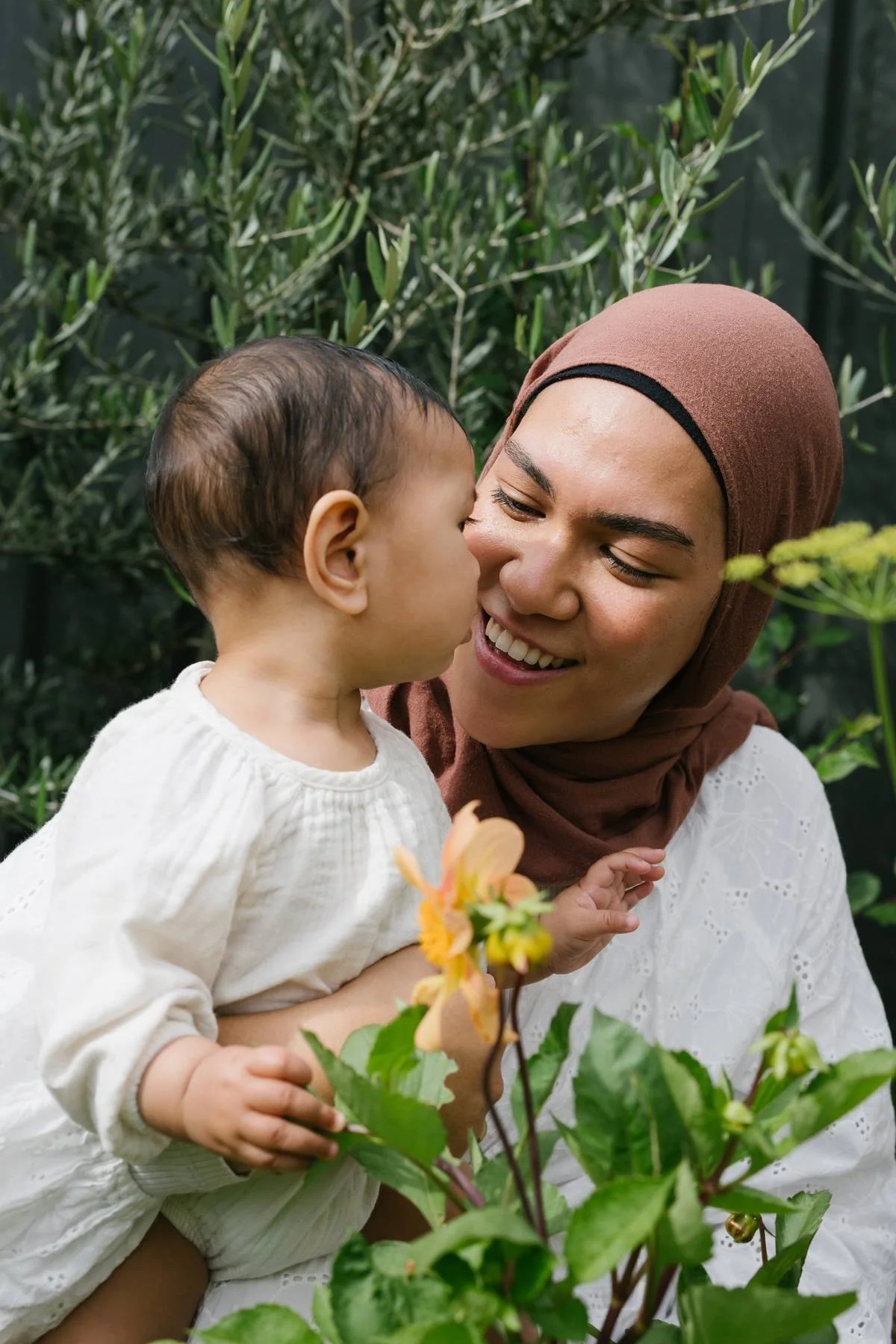 Gess and Zayla in their home garden, photo by Jessica Prescott