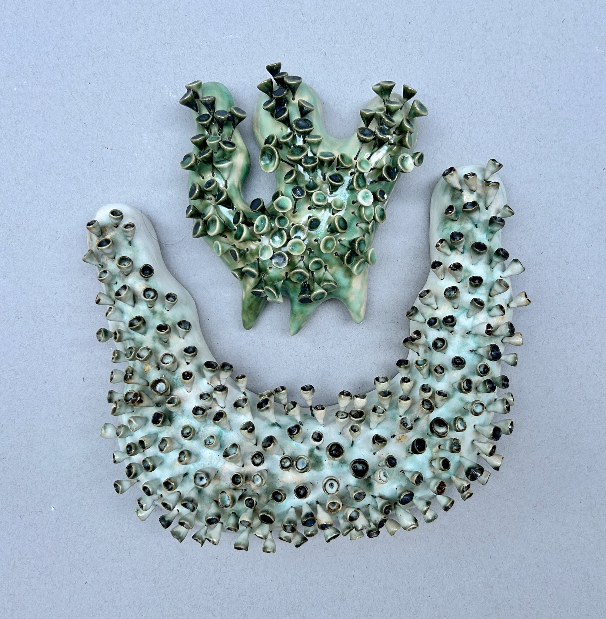 Symbiosis, ceramic, 12 x 11x 3”, 2024