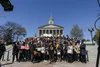 TIRRC group of supporters on capitol hill holding various signs