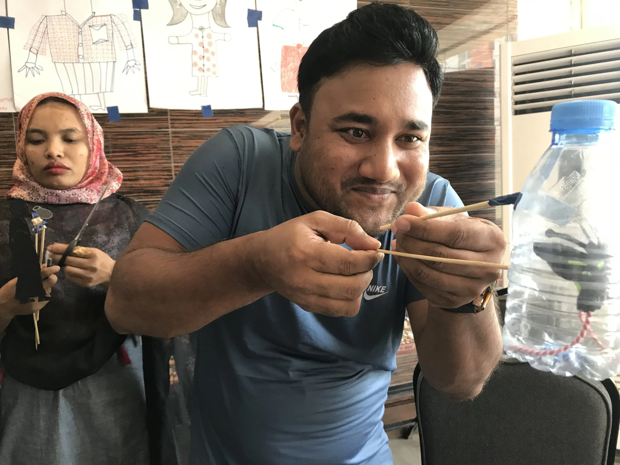 16. Bangla faciltator butterfly bottle.jpg