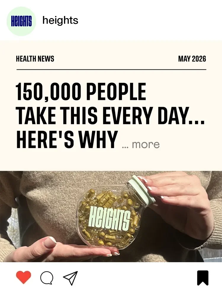 A person holding a jar labeled 'heights' filled with capsules or pills, wearing a beige sweater.