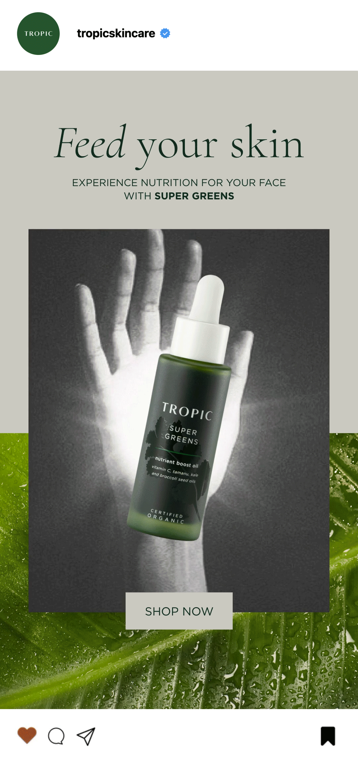 Instagram post promoting Tropic skincare's Super Greens nutrient boost oil with a background of green leaves and water droplets, and a bottle of the product in the center.