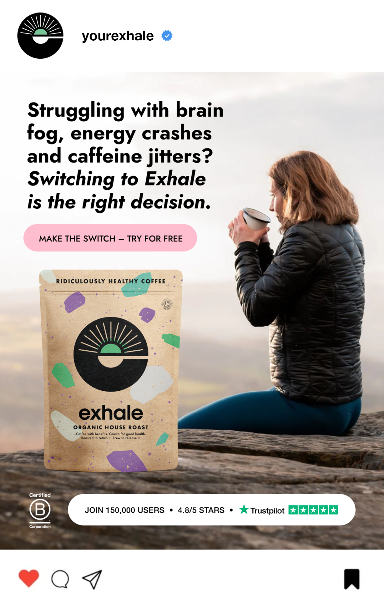A woman with brown hair, wearing a black jacket and blue leggings, practicing yoga outdoors on a rock with a cup in her hand, with a sunset or sunrise in the background. A package of Exhale organic coffee is in the foreground.