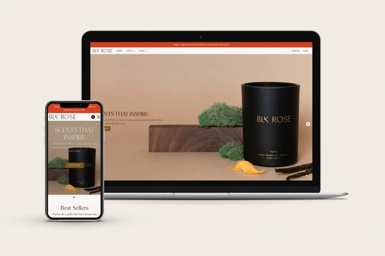 laptop and iphone display of candle website, black candle jar with brown background and vanilla beans and orange to signify the scent