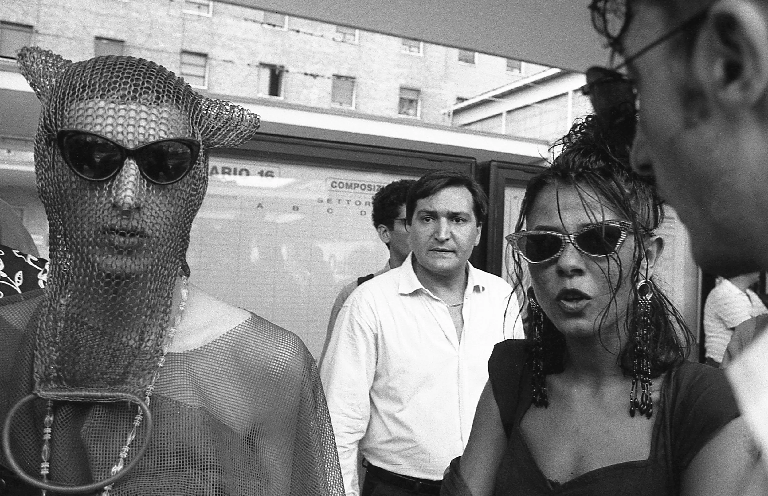 Photograph by Tony Davis. Italy Week, styling out a string carrier bag, House Train, Italy 1991