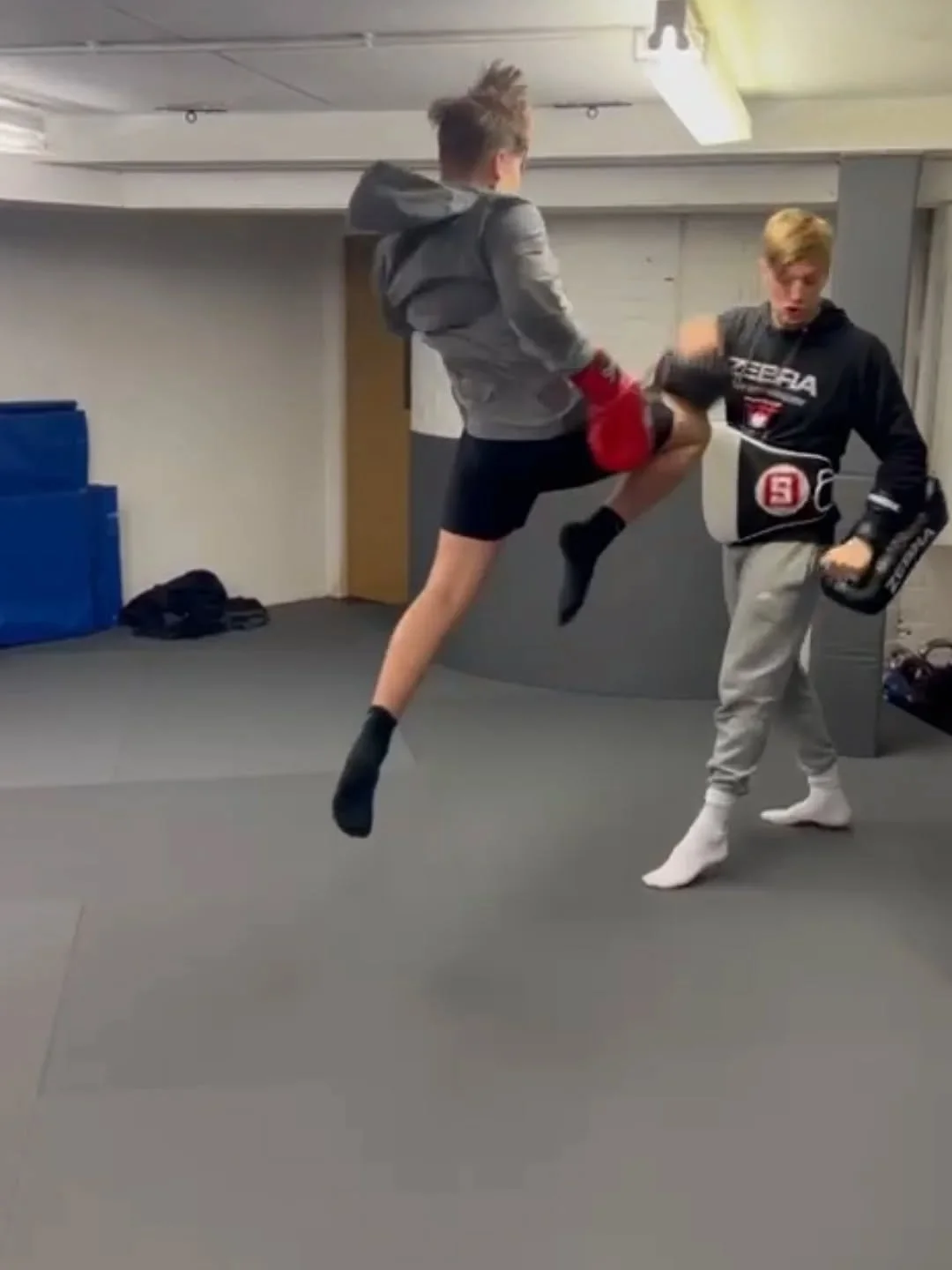 K1 inspired drills today from @susanxmxg . Heavy hooks and kicks followed by a jumping knee...

Nothing like seeing a pupil grow  in confidence and physical ability. 

Though we post a lot of images of pupils working in the gym, what isn't as flashy 