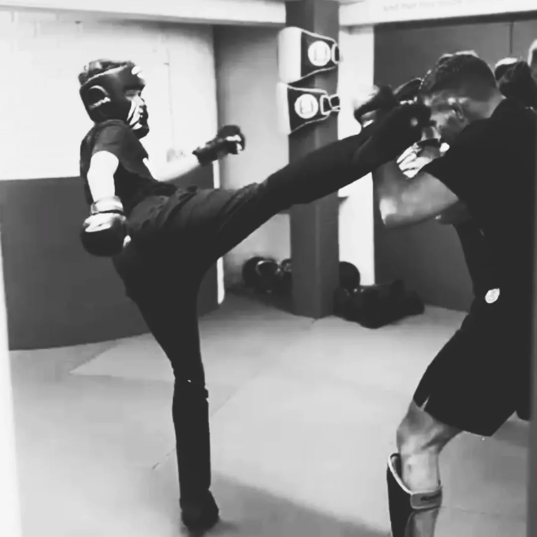 Martial arts is all about control: Emotional and physical. 

Great head kick in live sparring from one of pupils here - good job Coach Ando has a tight guard!