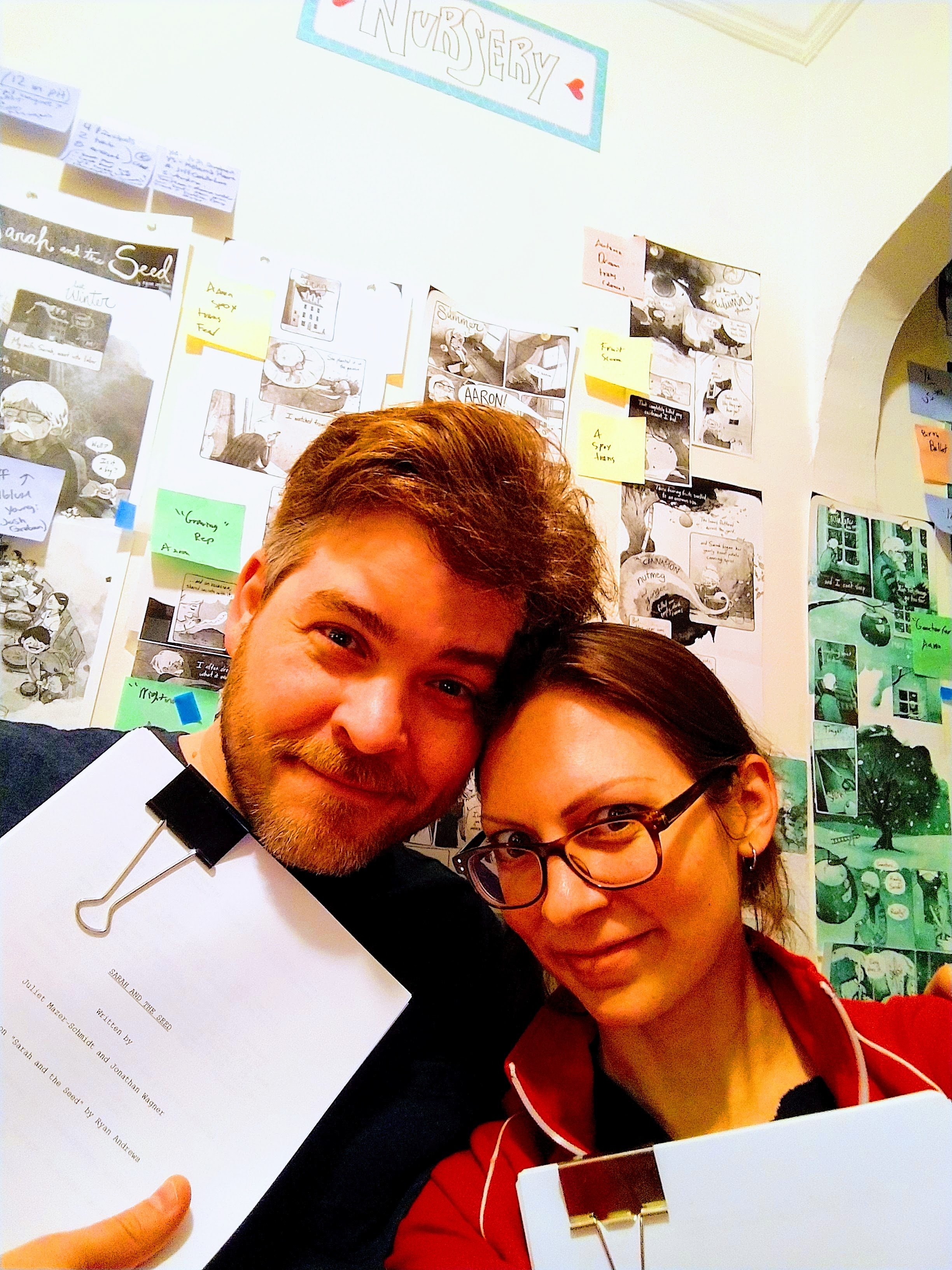 Juliet and Jon holding their printed work