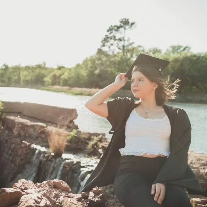 This senior wanted to do her photos in nature, especially with water involved. Not only does she look great, but she looks so at peace within her element.