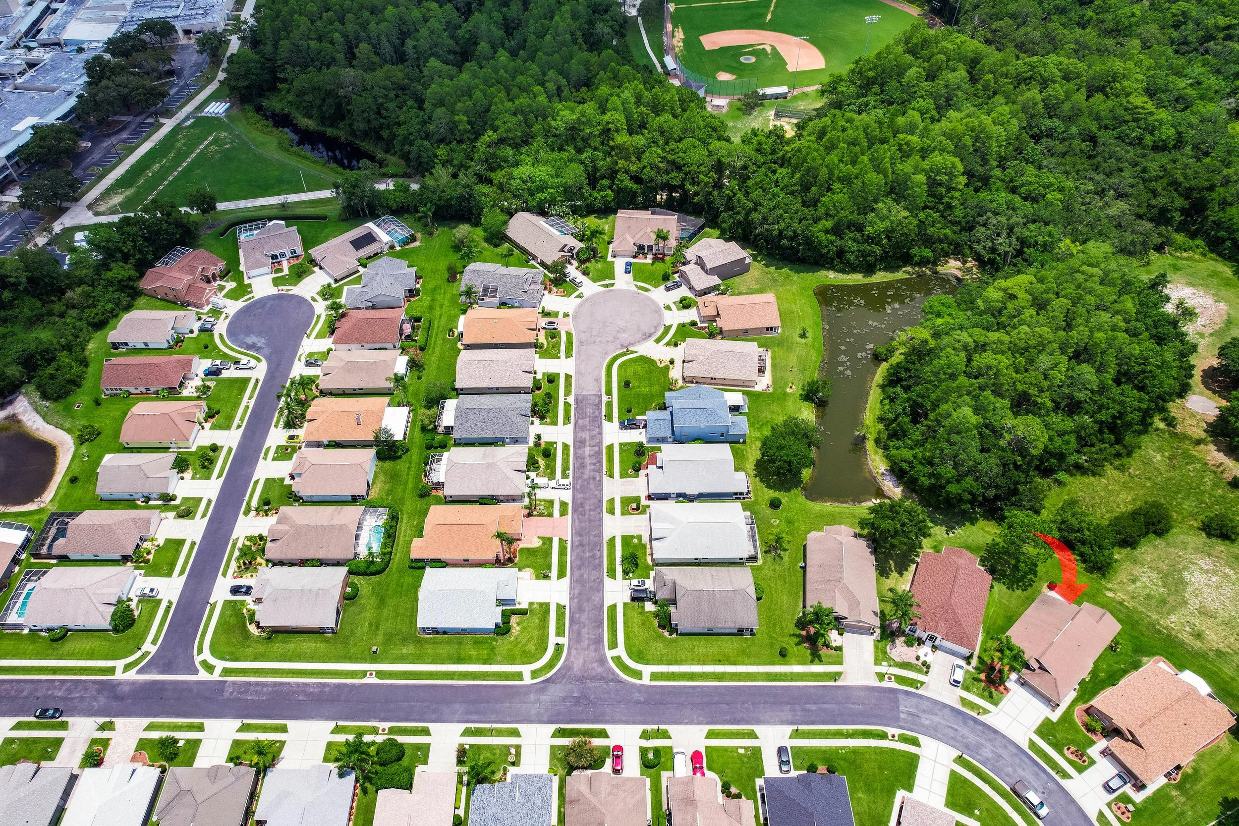 Overhead aerial image of modern homes with landscaped yard.jpg