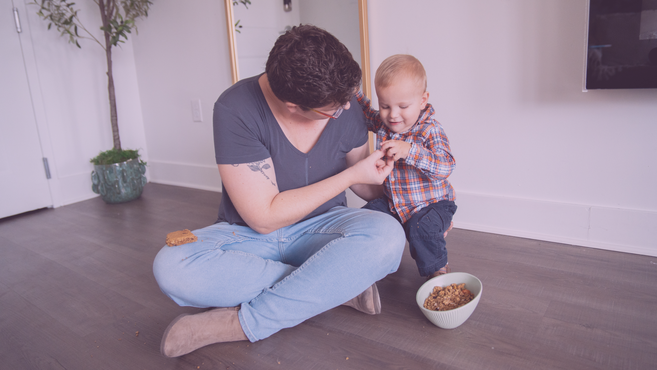 Breastfeeding Mom Eating Lactation Snack with Toddler