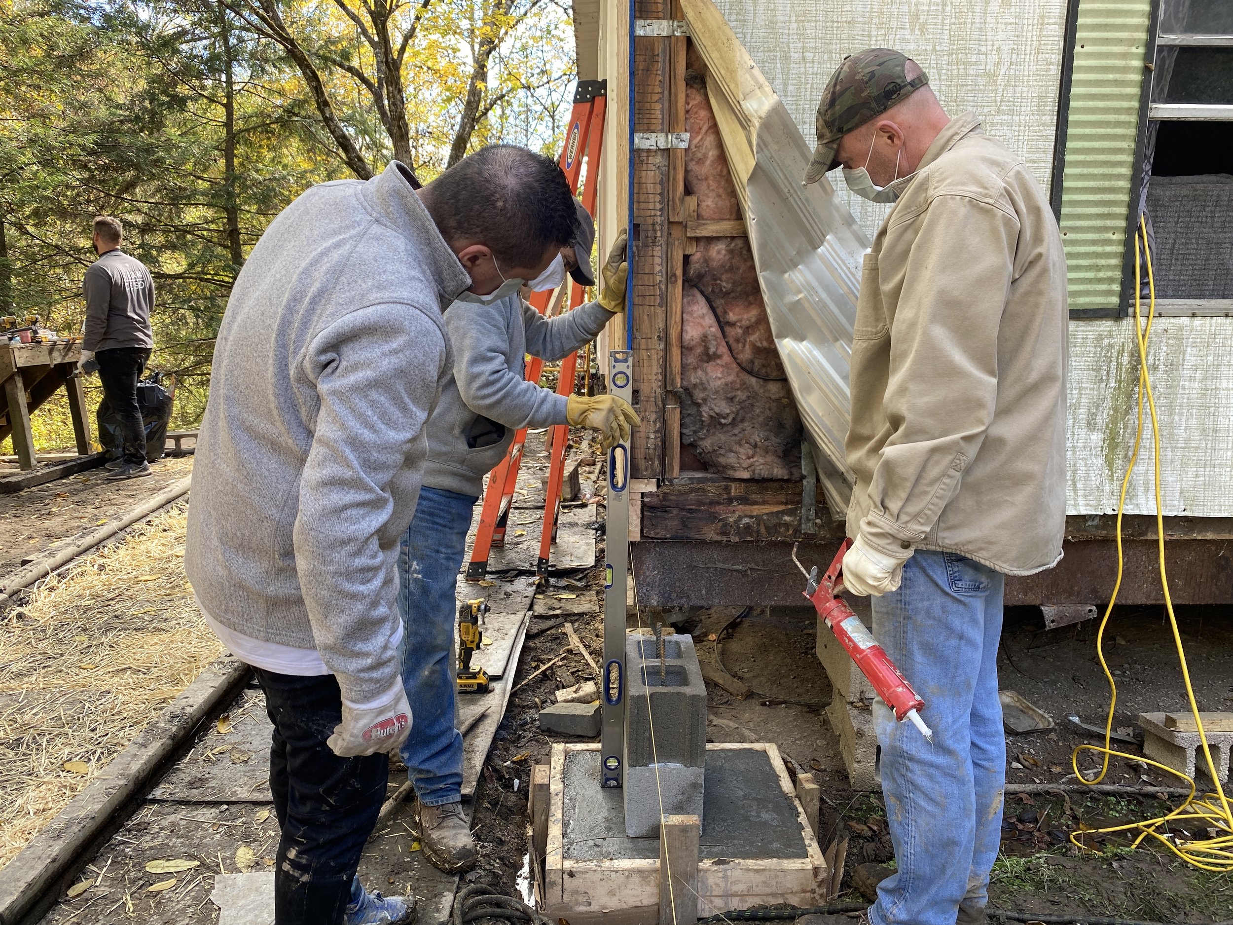 CESO volunteers prepare to add an addition to this home.