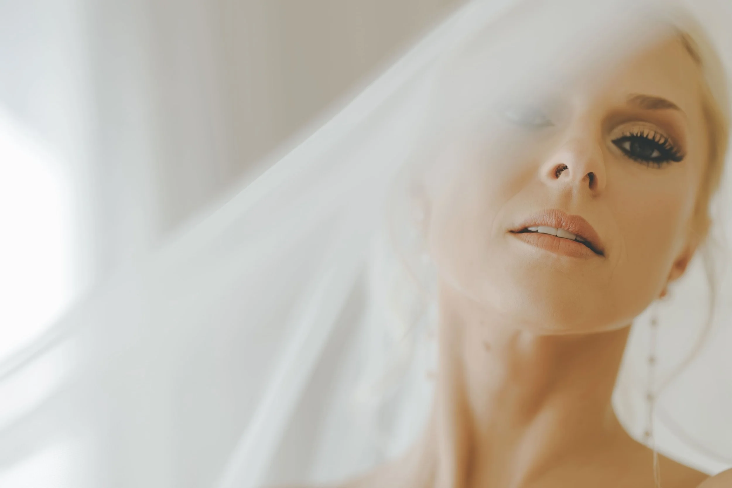 Close-up of a bride's face beneath her veil at a Punta Cana wedding