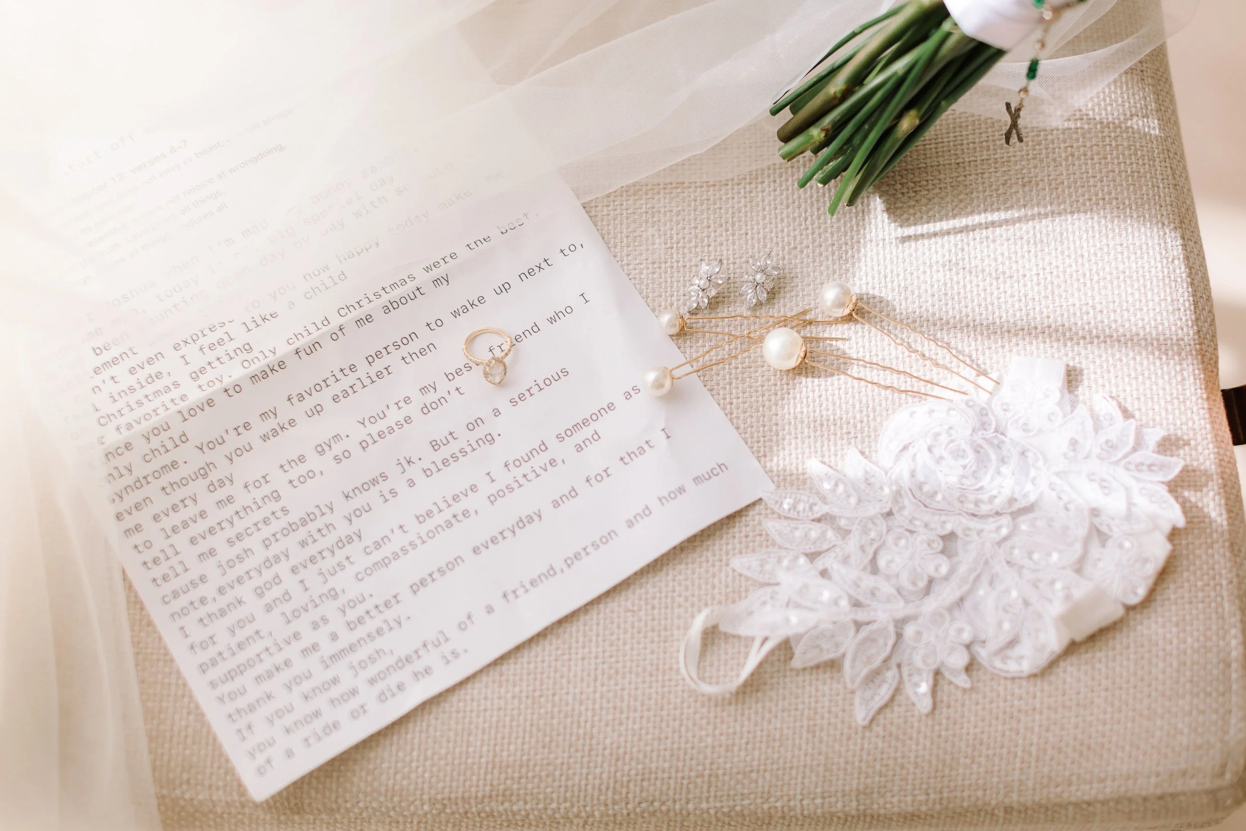Wedding day details including a love letter, earrings, and lace at a Punta Cana wedding