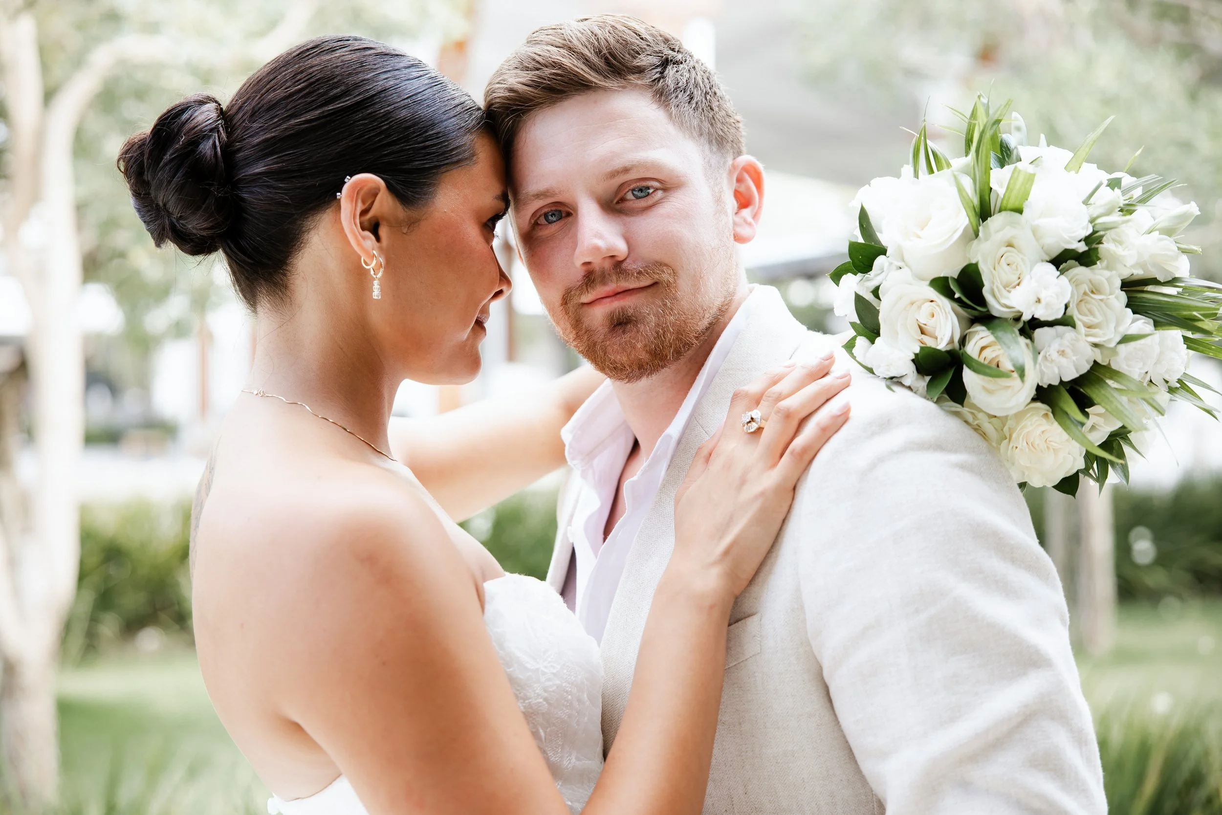 secrets-tides-bride-groom-embrace-garden1.jpg