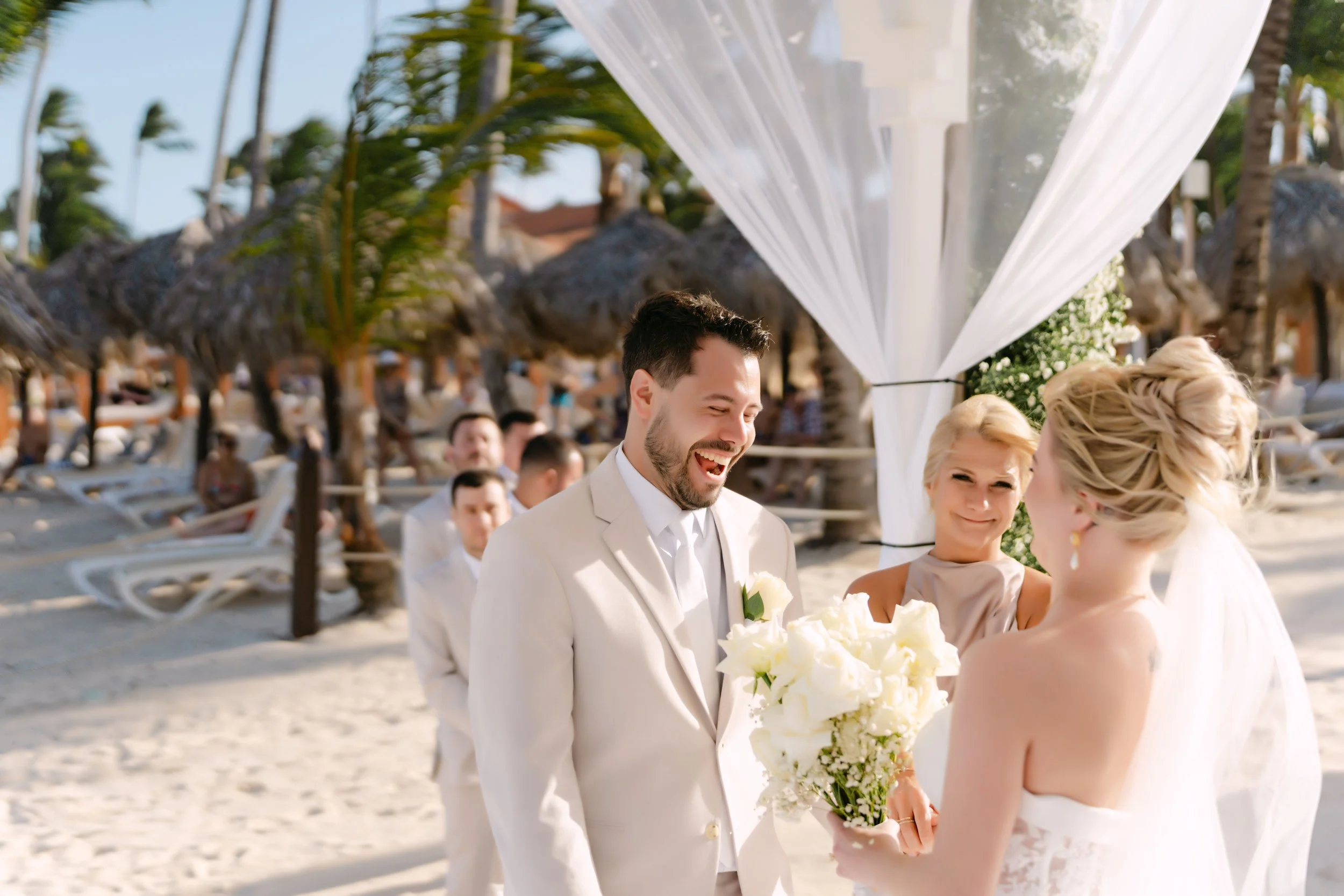 Bride and groom just married at their beach gazebo ceremony at Majestic Punta Cana