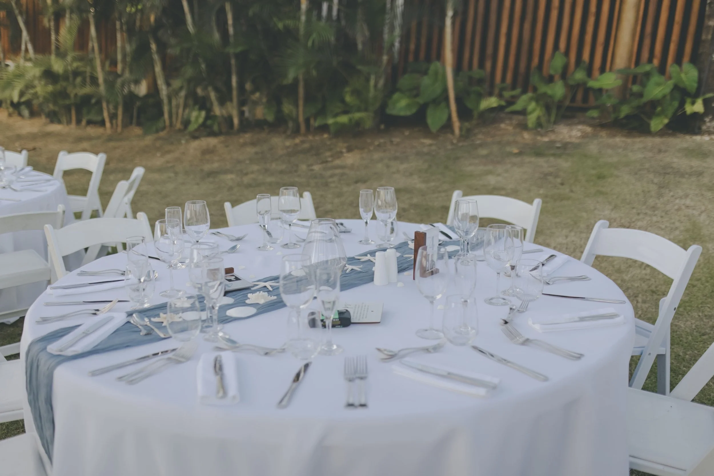 Elegant white reception table setting at a Punta Cana destination wedding