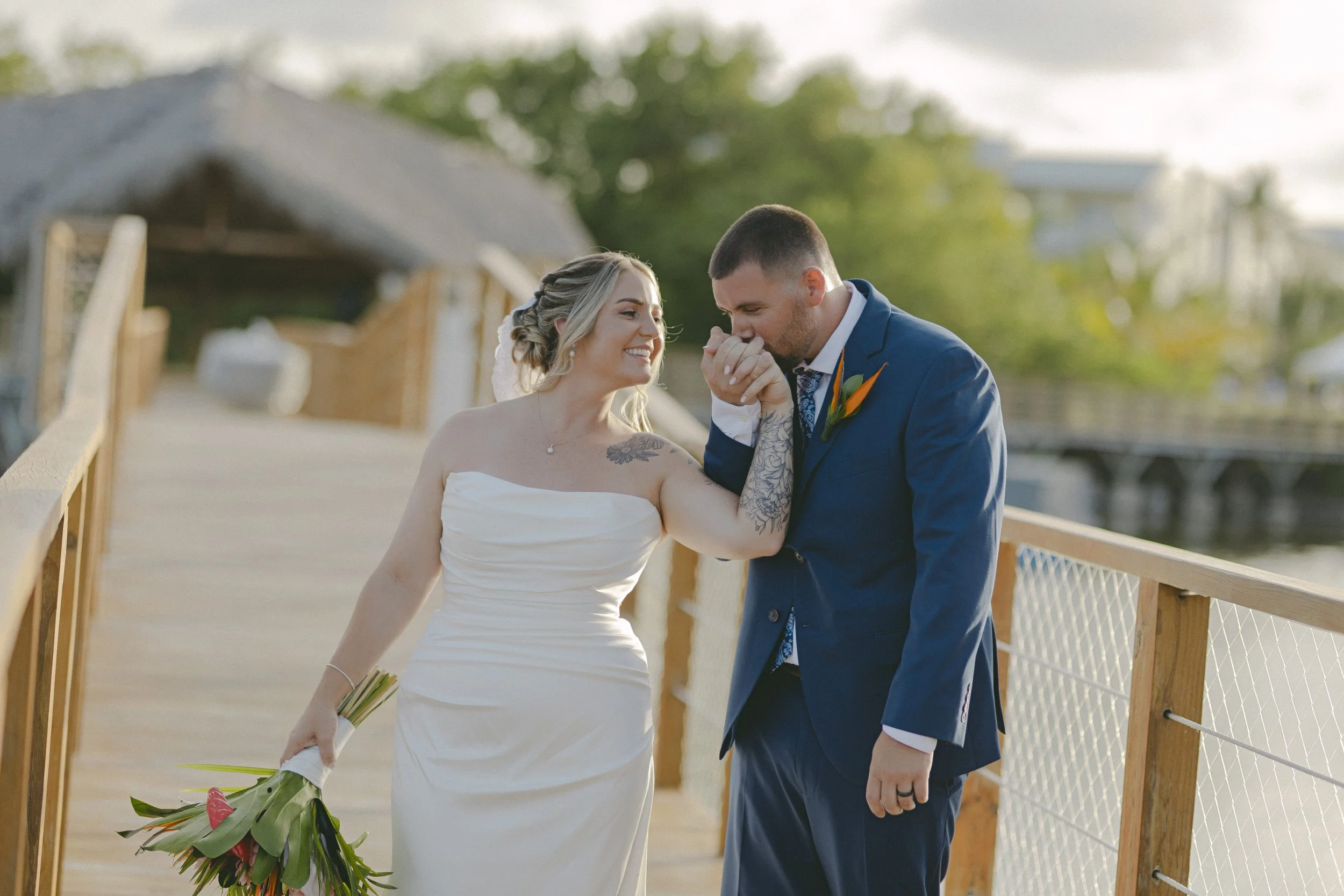 Bride wiping happy tears during emotional wedding moment at Dreams Royal Beach