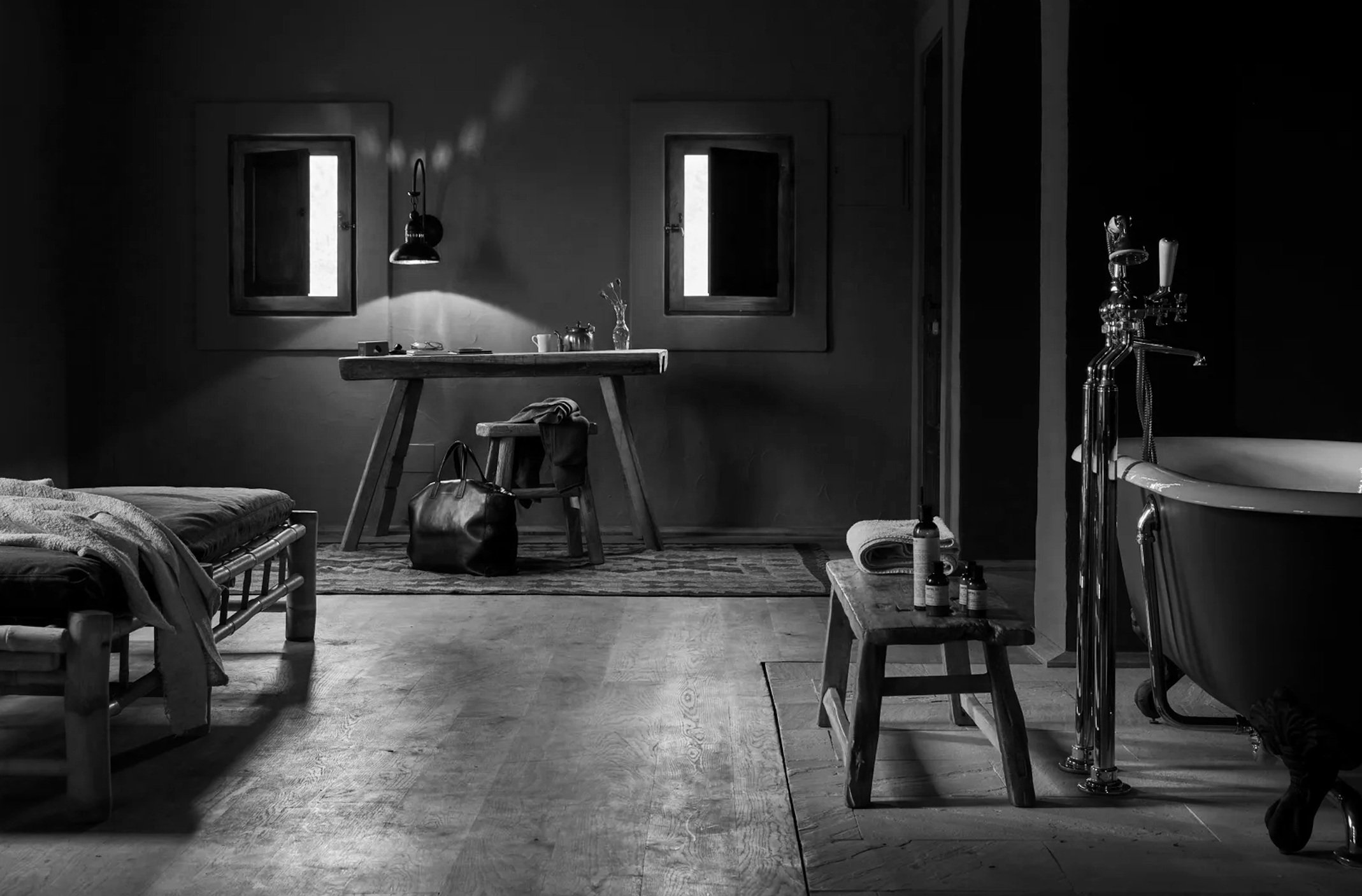 Guest room at La Granja in Ibiza, with minimalist design and natural light, offering a tranquil retreat.