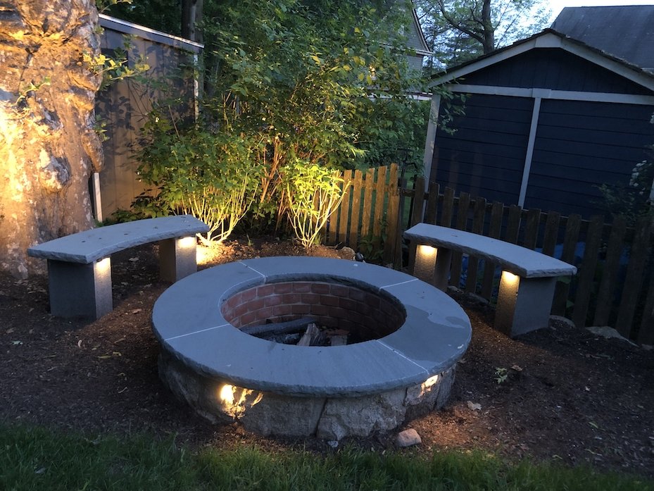 Fire pit landscape lighting for smores nights outside with your family in your backyard.jpg