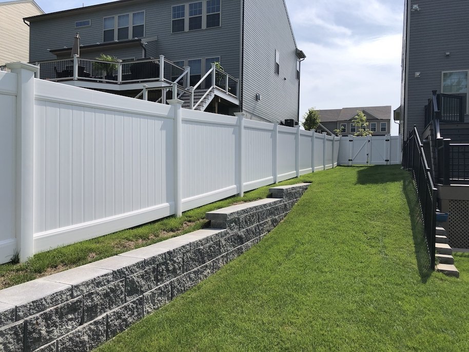 White vertical fence design for home privacy from neighbors.jpg
