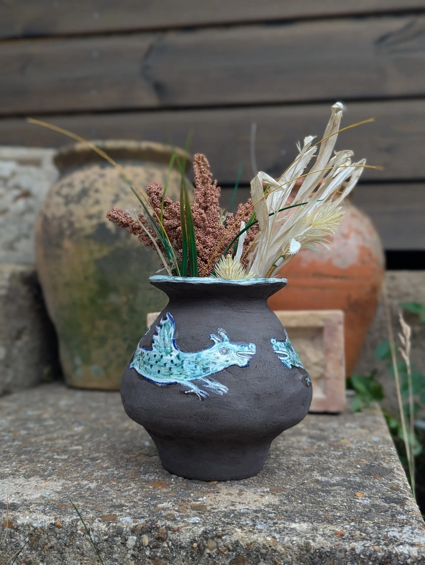 The second firing of the dragon vase worked a treat 💚🐉