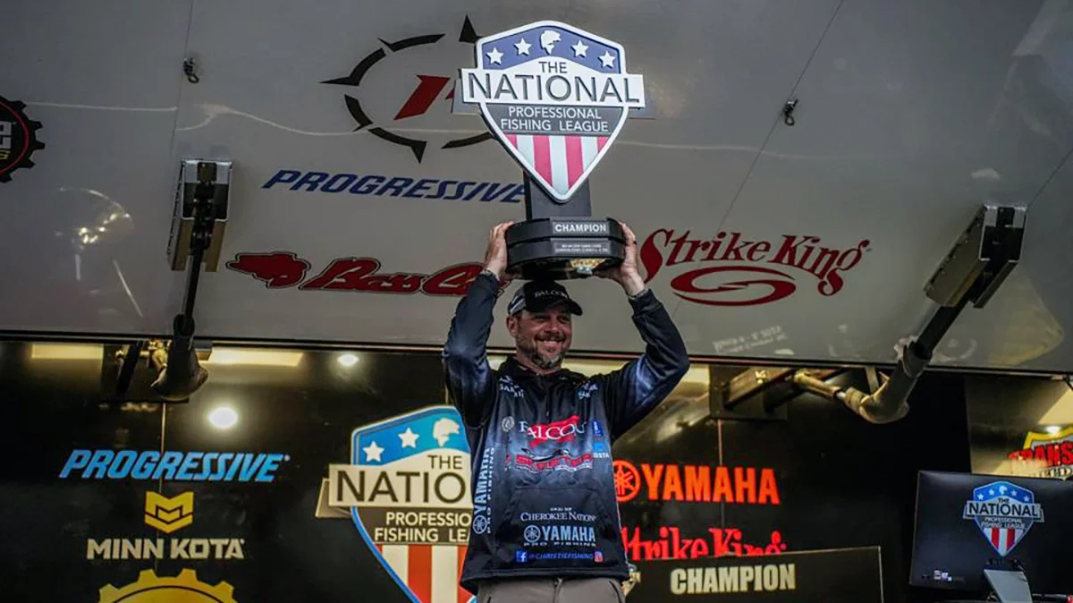 Jason-Christie-with-NPFL-Trophy.webp