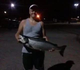 (August, 2010) I was 15 the first time i caught a salmon on the big water. We went out of Lake Michigan for three days and it was the only fish of the trip! 33&rsquo; down on a Moonshine Glow Ludington Watermelon spoon. I remember it was an intense f