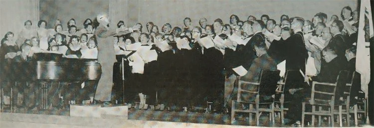 Randall Thompson conducts a combined chorus including HCS in the 1959 premiere of Frostiana.