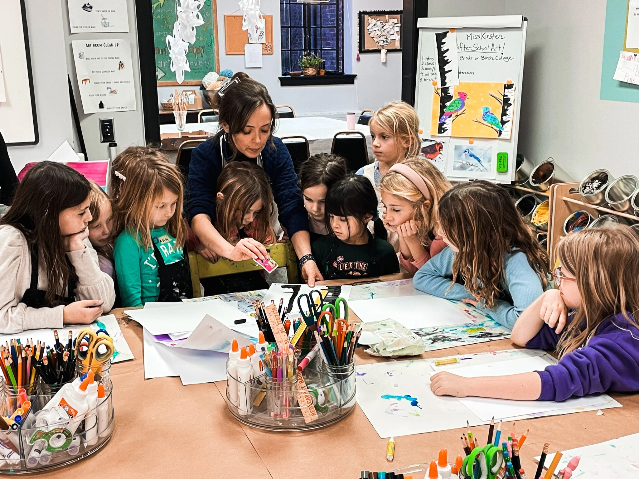 Art teacher giving instruction to elementary school art students in Richmond Virginia