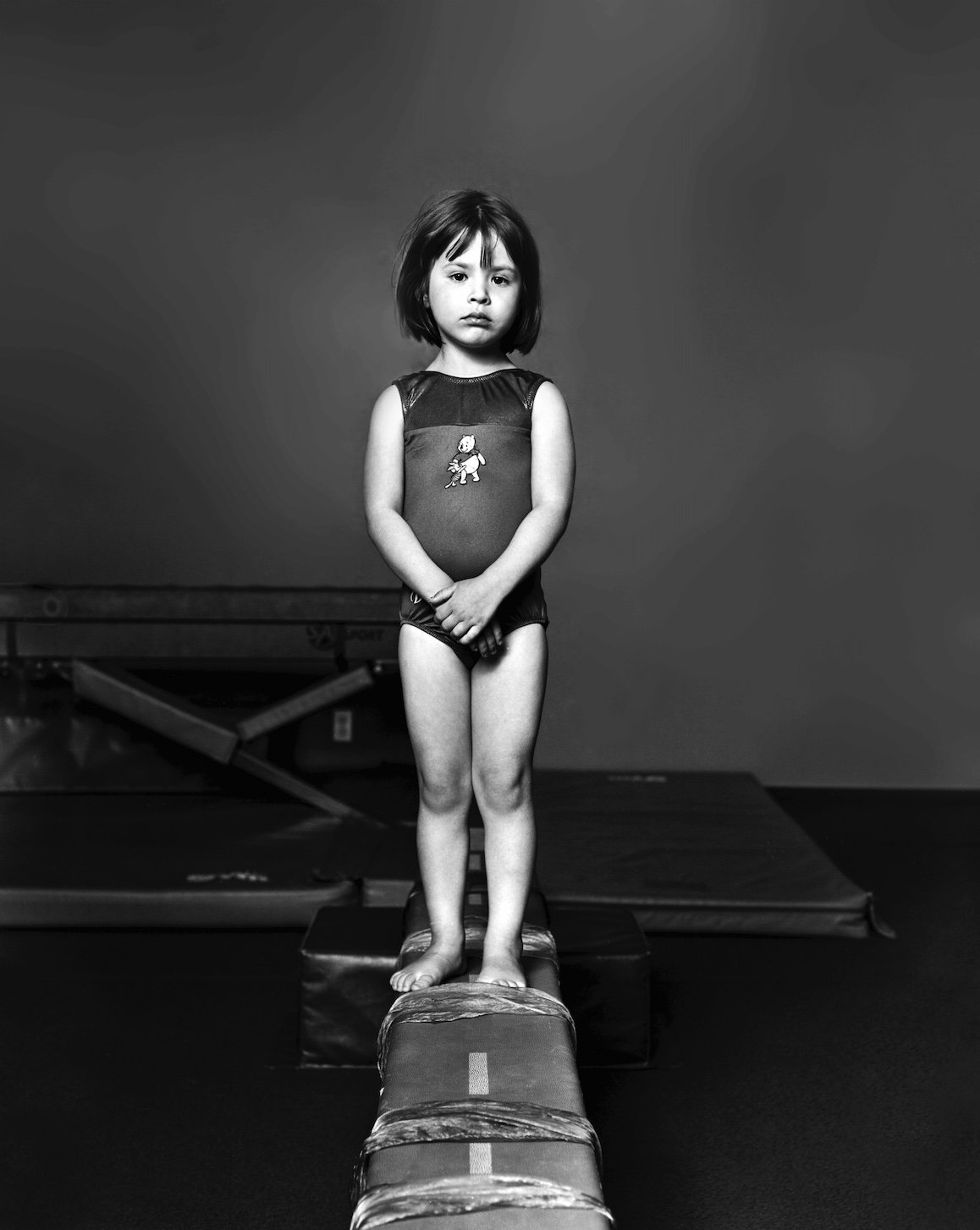 Untitled (Edith)
Edith, wearing my first ever leotard. I loved Winnie the Pooh and wore the leotard to my Father Tot class, which is where my gymnastics career began.