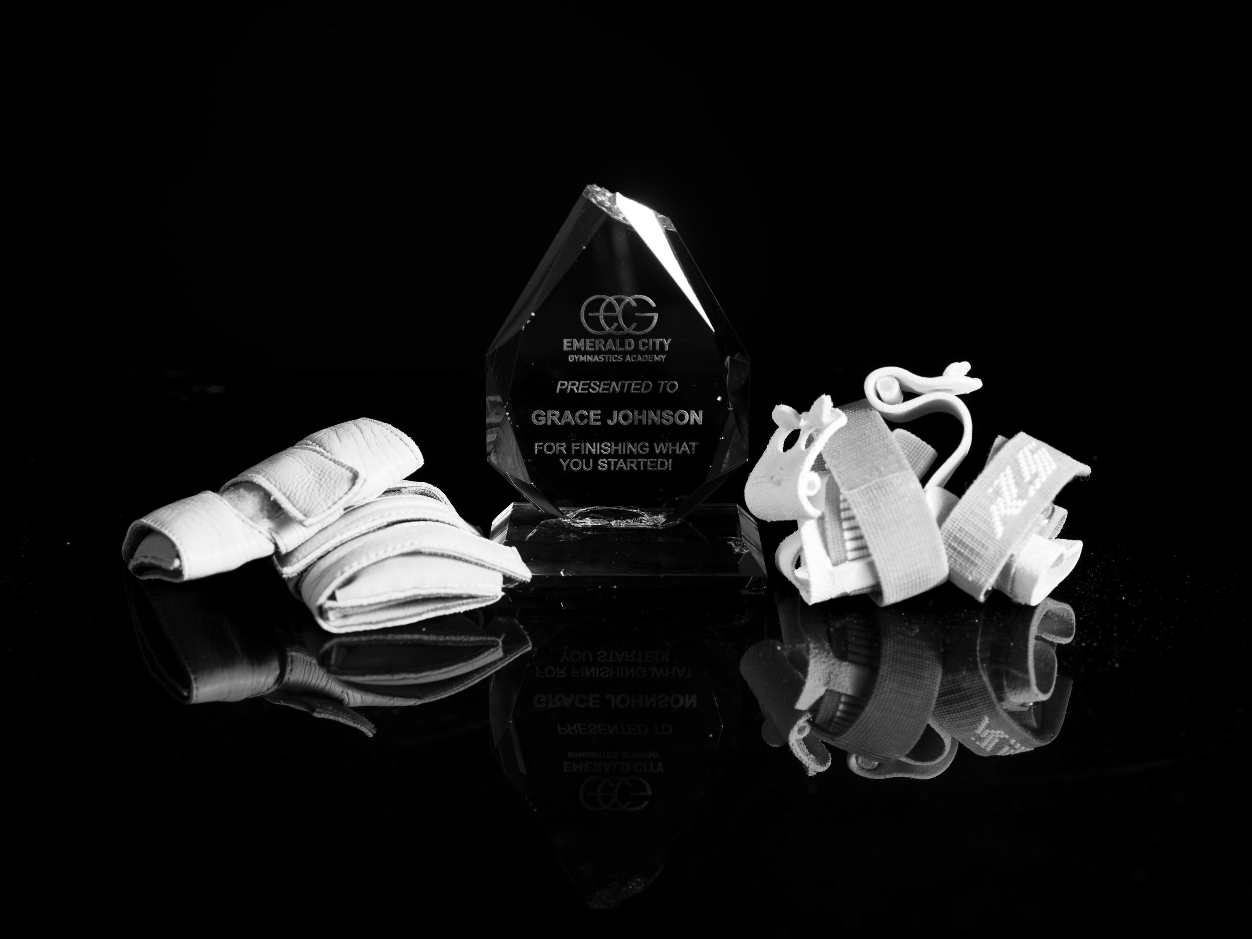 Untitled (Trophy)
This trophy was awarded to me for graduating high school by my club gymnastics academy, alongside a pair of Tiger Paws that protect the wrists, and Grips that protect the hands. This trophy felt like a backhanded award, considering