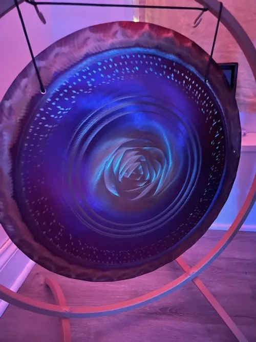 A large purple gong for sound Bath sessions