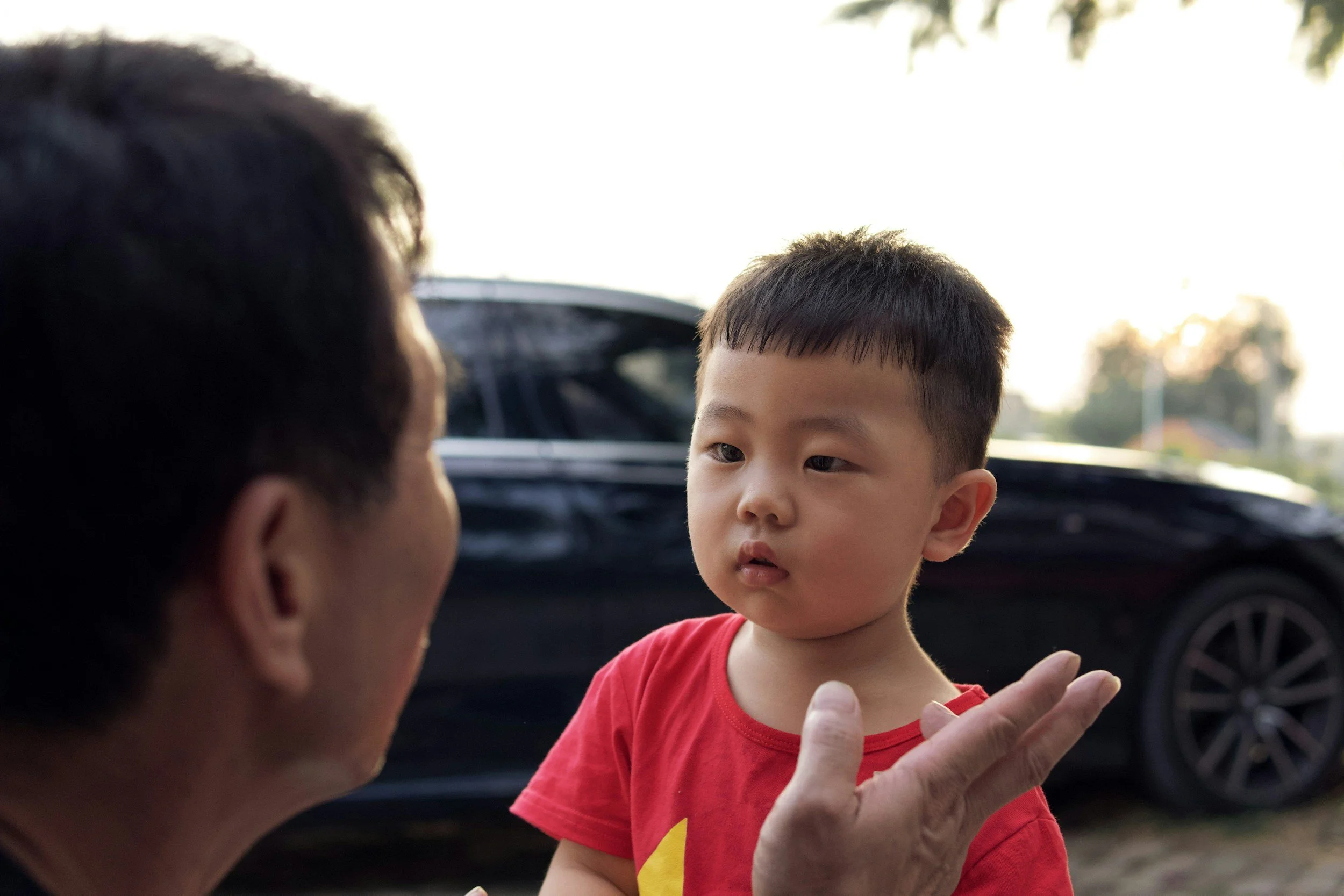 Young child listening and processing spoken language during everyday parent-child interaction.