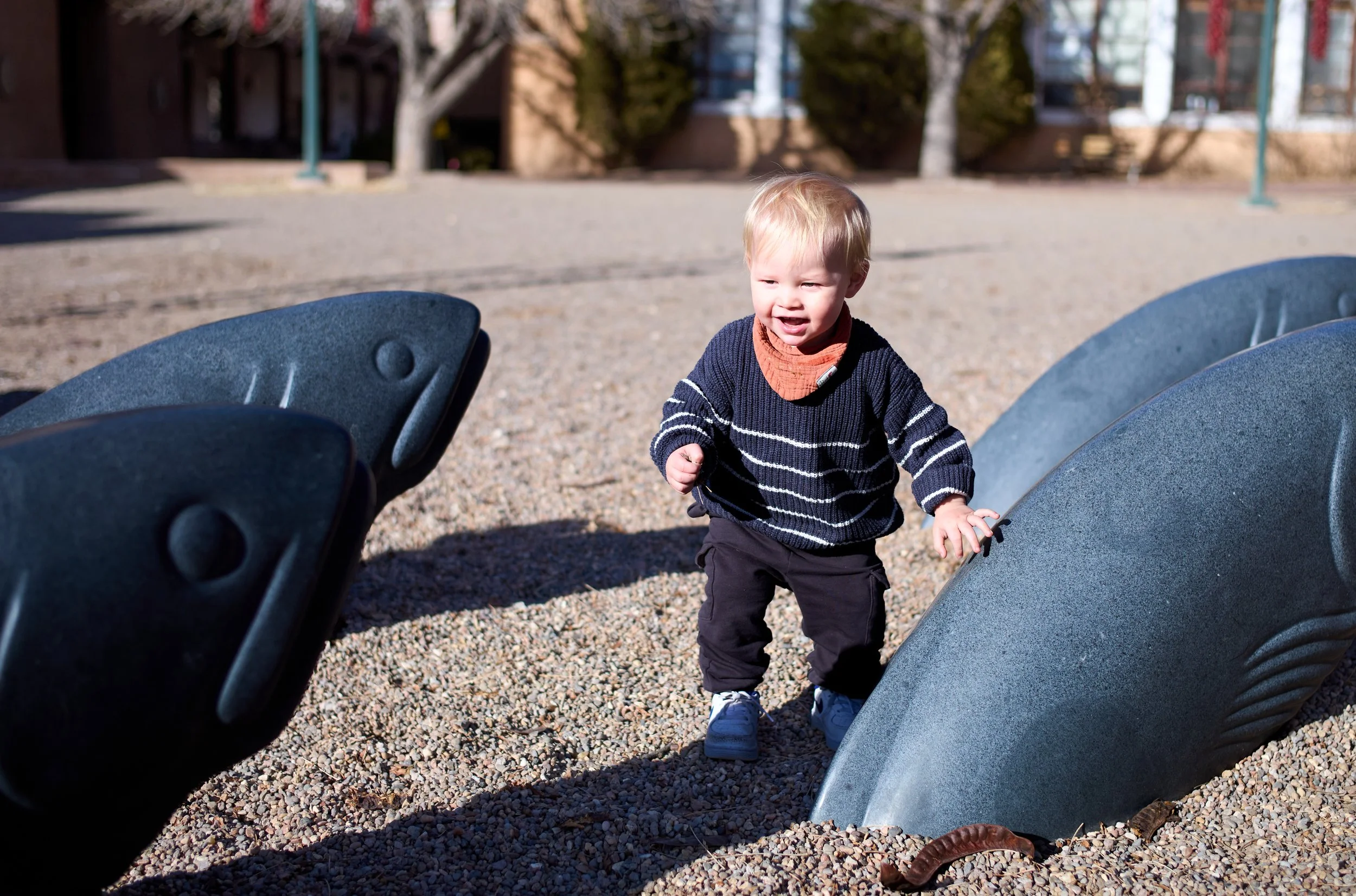 Smiling toddler representing care at The Therapy Collaborative (TTC) for Pediatric Therapy Services.