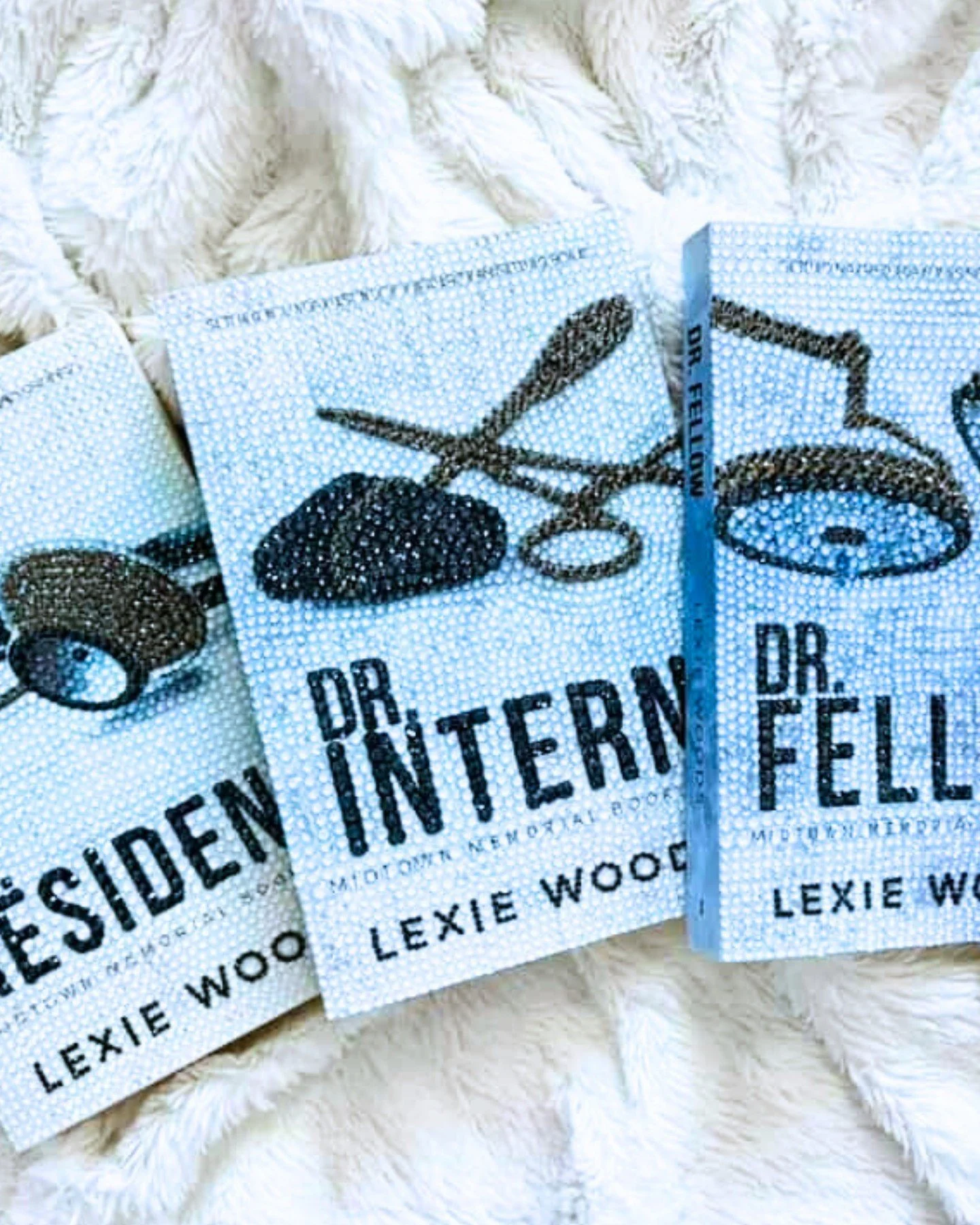 Sometimes treating yourself looks like sipping on a frozen margarita with nerd clusters on the rim. Sometimes it looks commissioning your books to be beautifully bedazzled by @rayychel_reads.

QOTD - If you had to see one Midtown Memorial character m