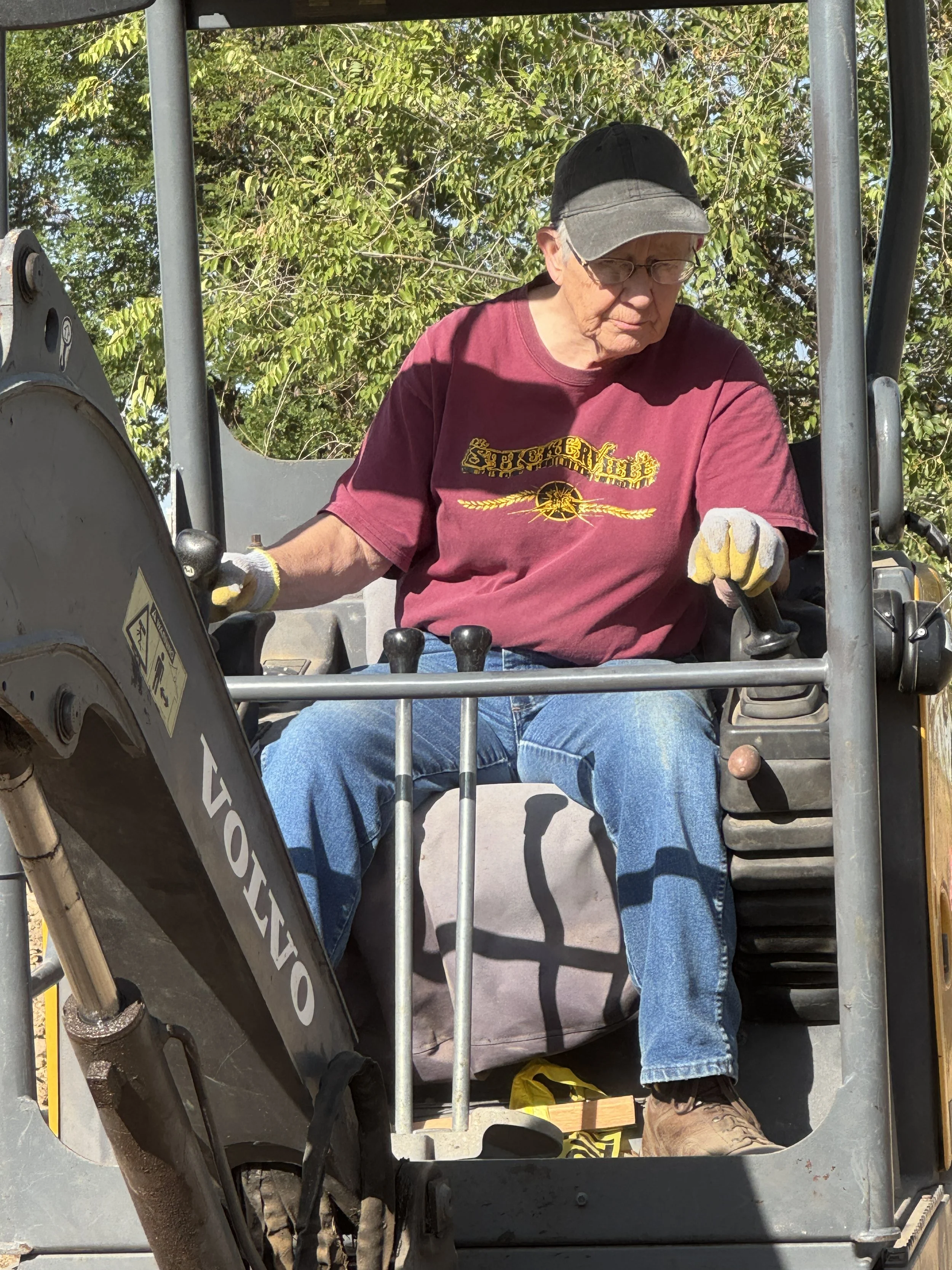 Marsha Schoeffler: expert excavator operator & darn good fiddler. 