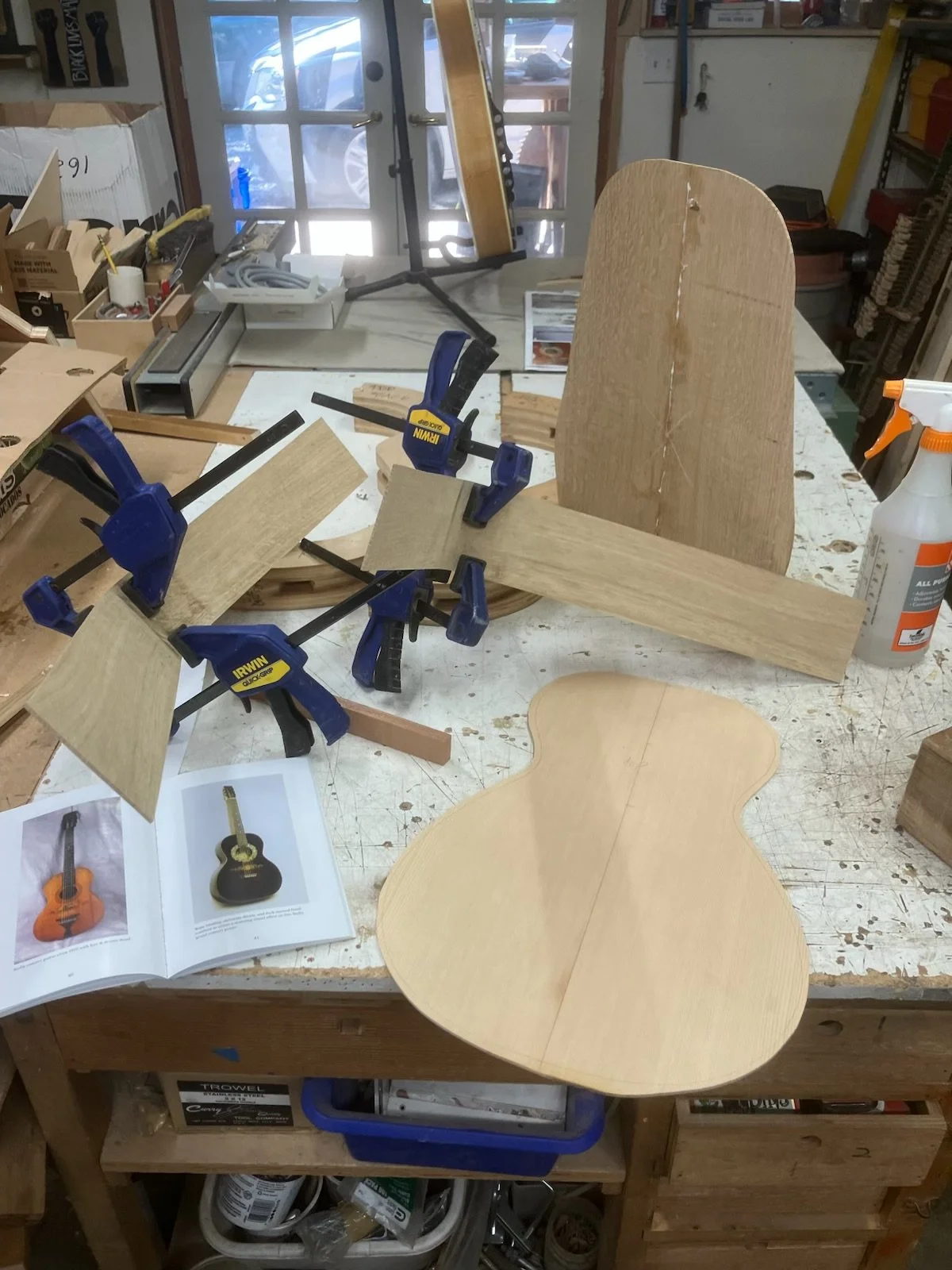 Update on custom guitar Ben Bonham is building for the Stickerville Auction.  Based on a 1920s Stella (black guitar pictured in book on the table in one of these photos). Old NW Sitka Spruce top from Bruce Harvey, Oak back and sides from Ben's local 