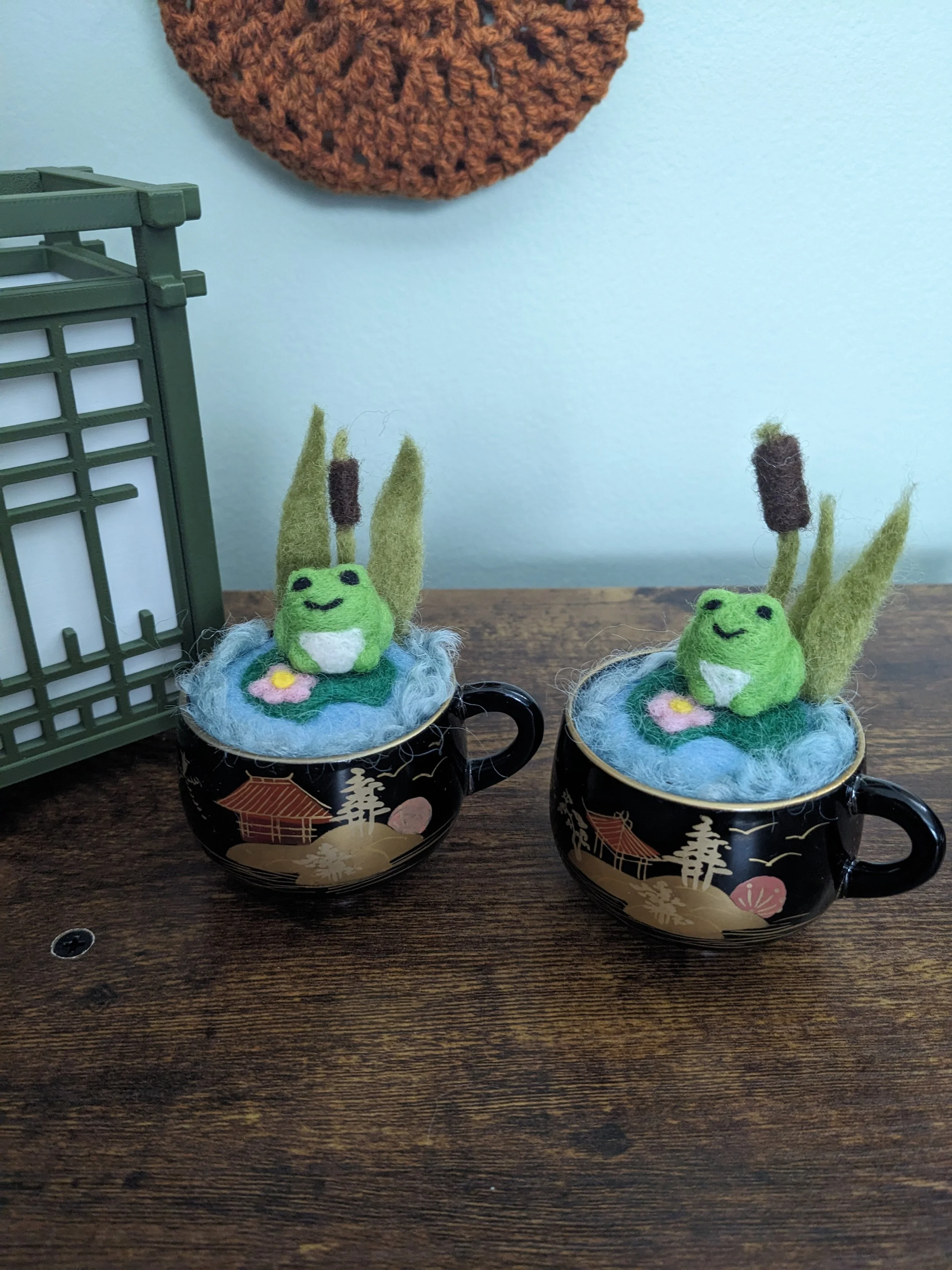 Needle felted frogs on lily pads