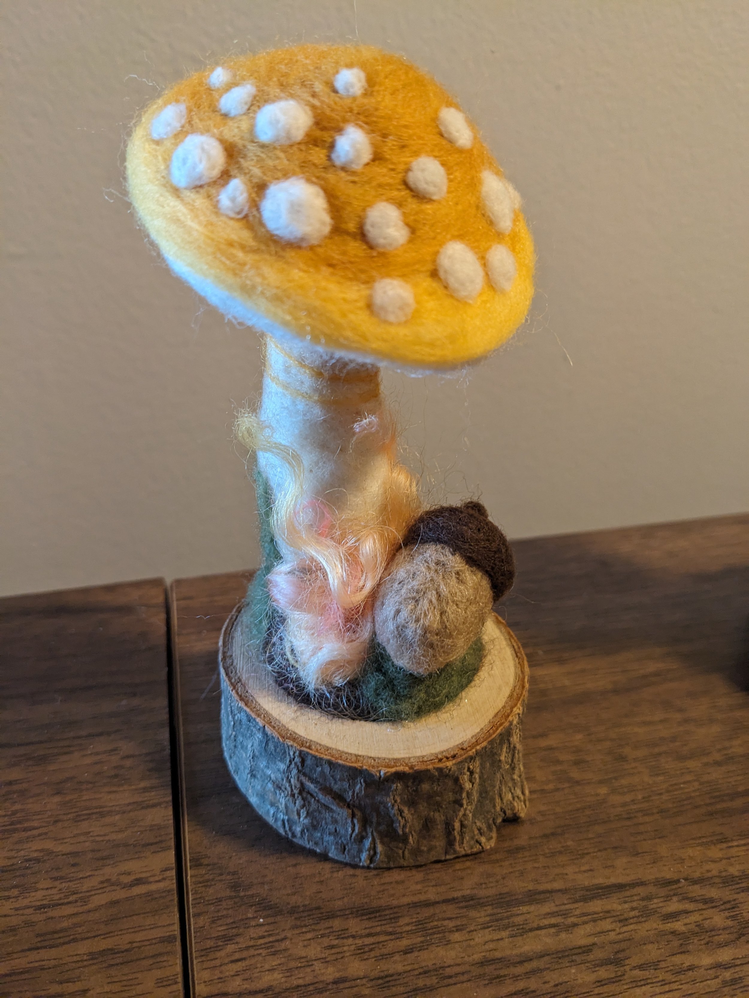 orange and yellow needle felted mushroom with acorn