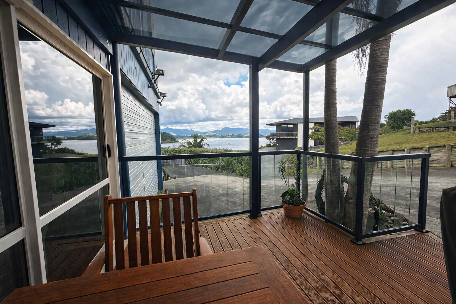 “Bay View Studio  — modern coastal stay in Coromandel with private deck and panoramic views over McGregor Bay.”