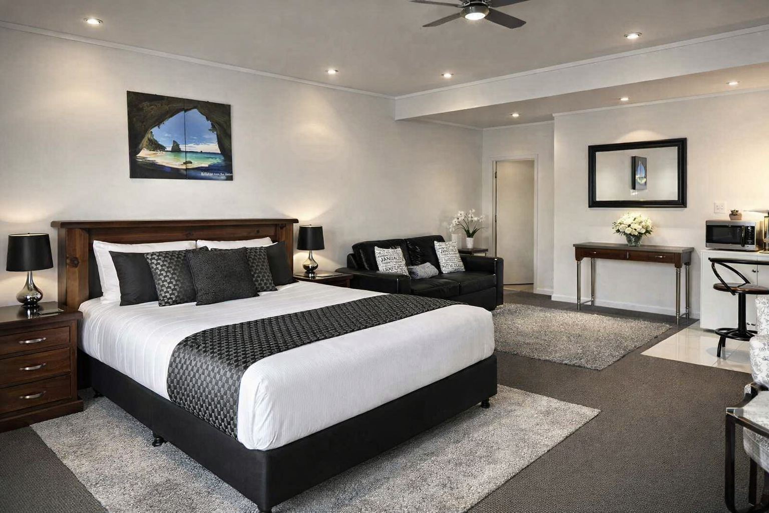 “Bay View Studio — bright, modern Coromandel studio with queen bed, kitchenette, and private balcony overlooking McGregor Bay.”