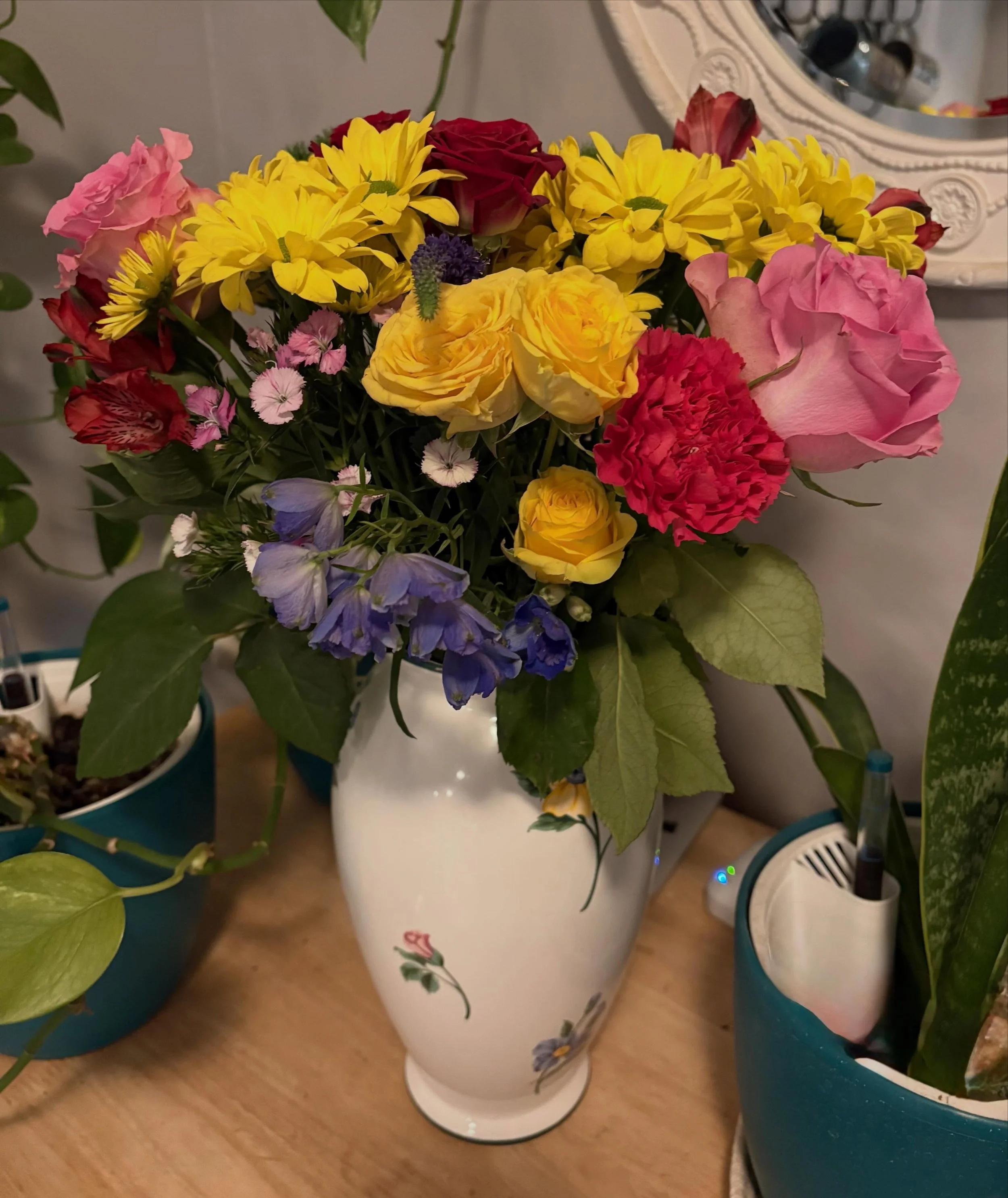 When you have a client who has been rescheduled 2 to 3 times because I had my 15 year-old bunny sick in March and then pass, and then my two elderly dogs sick and then pass on the same week to day early April - bring YOU flowers for her appointment w