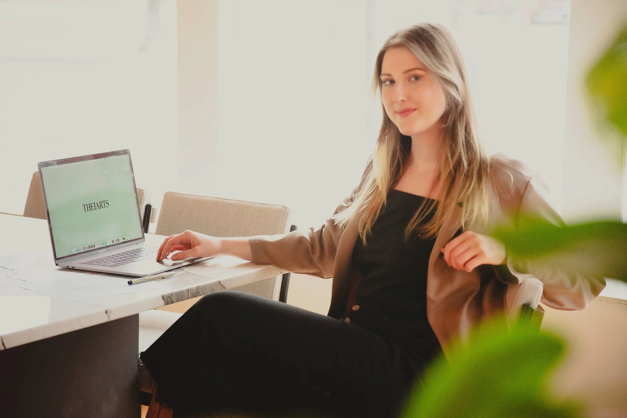 Karly poses for business headshot for Theiarts Design photograph by Life Times Photography