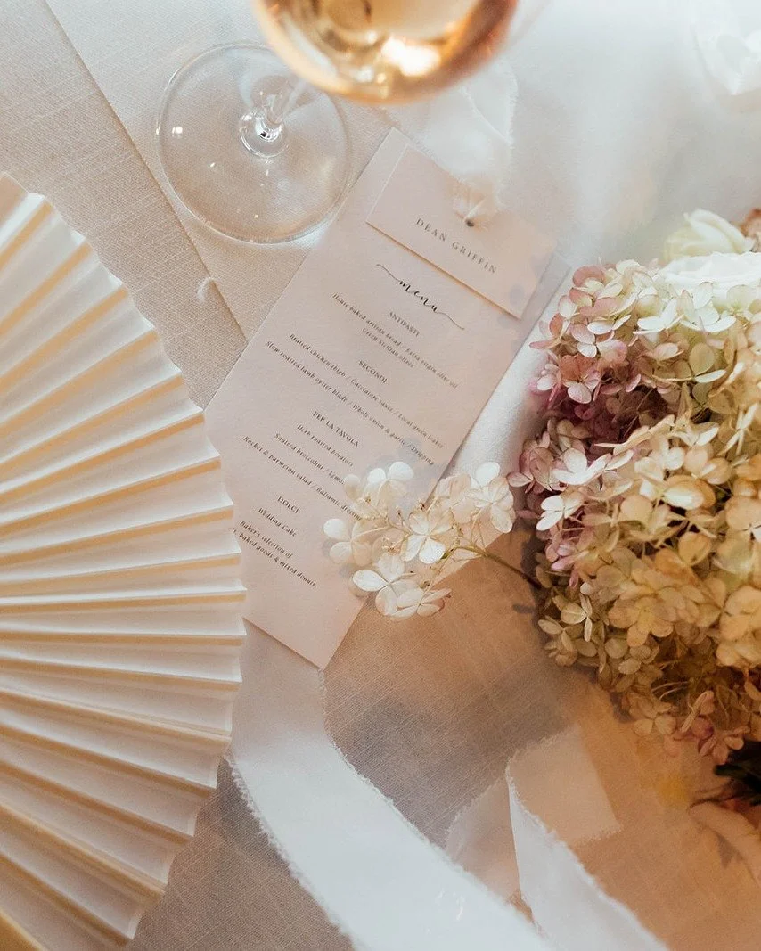 Timeless details for Arna &amp; Dylan&rsquo;s special day 🤍✨ Their wedding reception featured our custom menus and place cards, designed to complement the elegant tablescape. Soft, romantic florals and delicate stationery details created a beautiful