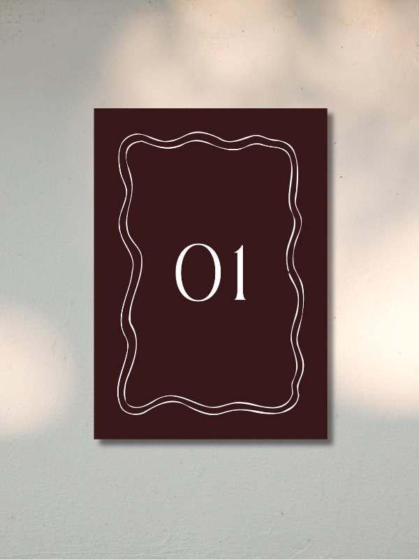 Number 01 on a dark brown sign with decorative white border, mounted on a white wall.