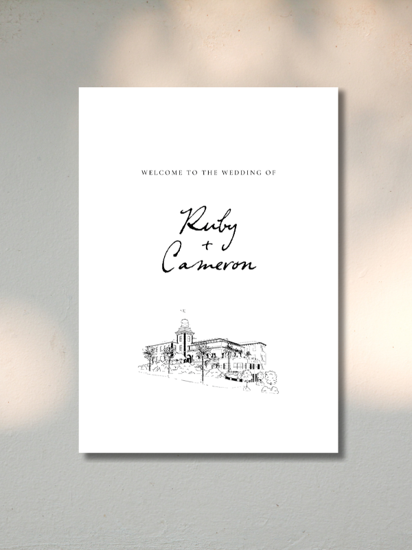 Wedding invitation with text and a sketch of a building and trees.