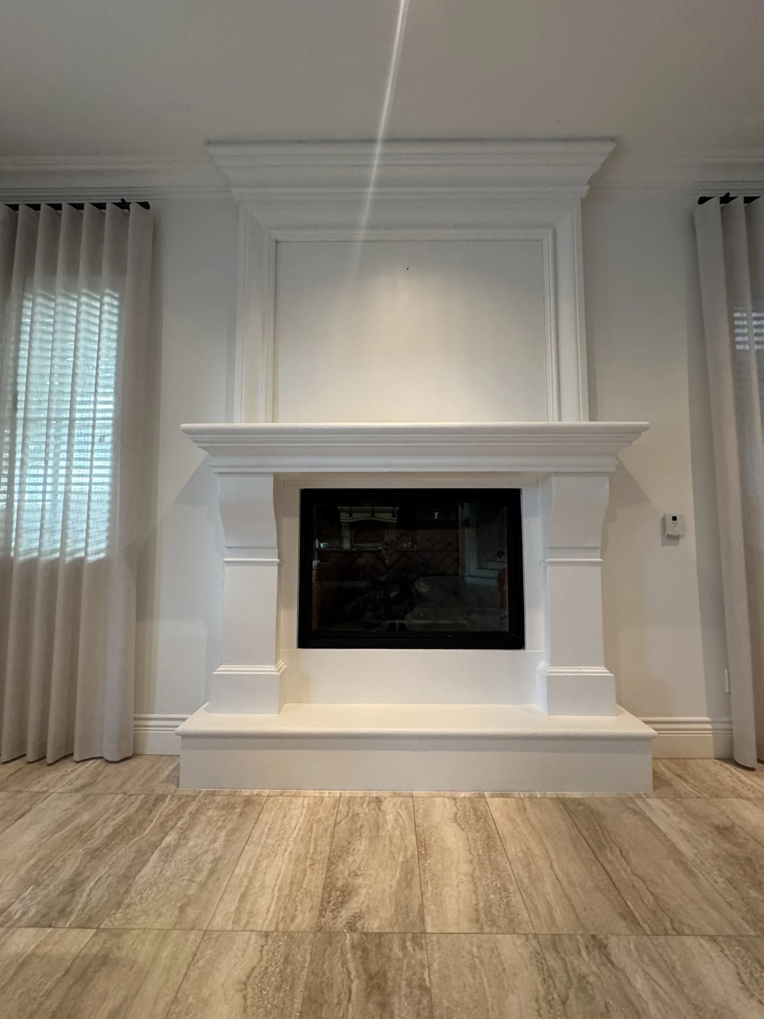 interior painting, spray-painting fireplace, fine-finish, painters North Vancouver, North Vancouver painting company